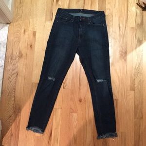 Fringe ankle and ripped knee jeans